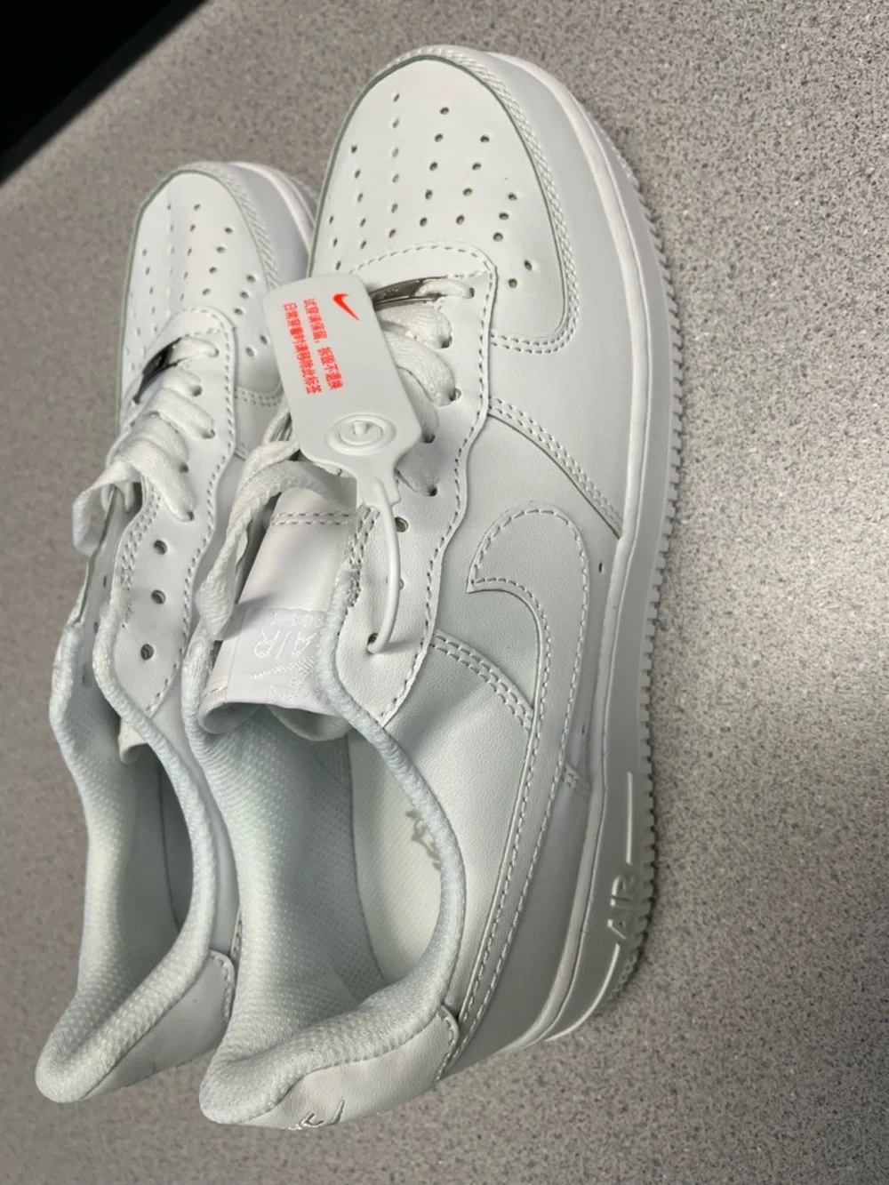 Nike All-White Leather Low-Top Sneakers